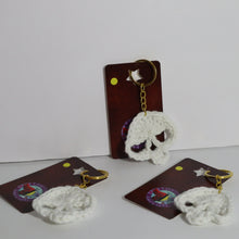 Load image into Gallery viewer, Golden Green Glow Crochet Skull Keychain