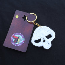 Load image into Gallery viewer, Golden Green Glow Crochet Skull Keychain