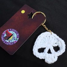 Load image into Gallery viewer, Golden Green Glow Crochet Skull Keychain