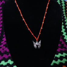 Load image into Gallery viewer, Orange Flutter Skull Crochet Beaded Necklace