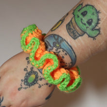 Load image into Gallery viewer, Neon Pumpkin Crochet Scrunchie
