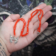 Load image into Gallery viewer, Orange Flutter Skull Crochet Beaded Necklace
