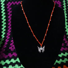 Load image into Gallery viewer, Orange Flutter Skull Crochet Beaded Necklace
